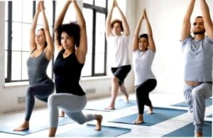 Some young and beautiful girls are shown doing yoga in the image.